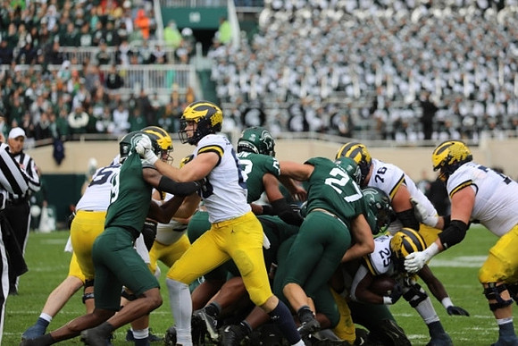 Karsen Barnhart (52), Luke Schoonmaker (86), Hassan Haskins (25), Ryan Hayes (76), and Andrew Stueber (71)
