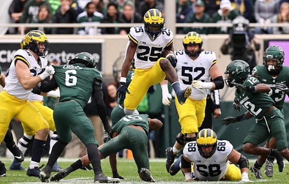 Luke Schoonmaker (86), Hassan Haskins (25), Karsen Barnhart (52), and Andrew Vastardis (68)