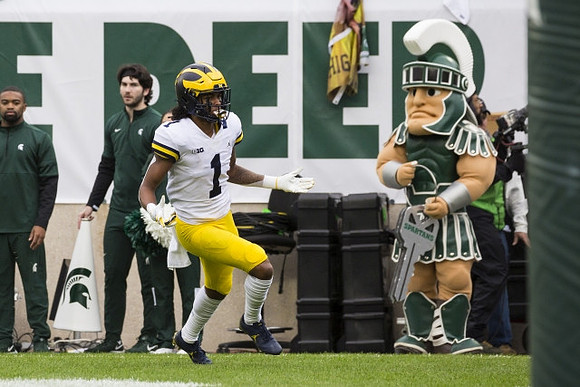 Andrel Anthony (1) and Michigan State Mascot
