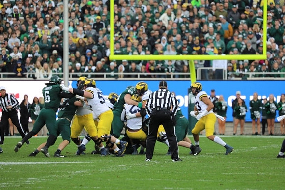Karsen Barnhart (52), Hassan Haskins (25), and Erick All (83)