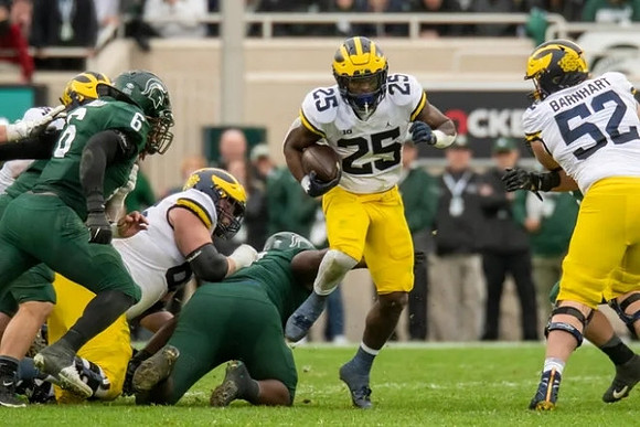 Hassan Haskins (25) and Karsen Barnhart (52)