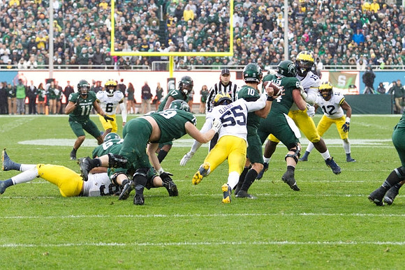 R.J. Moten (6), David Ojabo (55), Christopher Hinton (15), and Josh Ross (12)