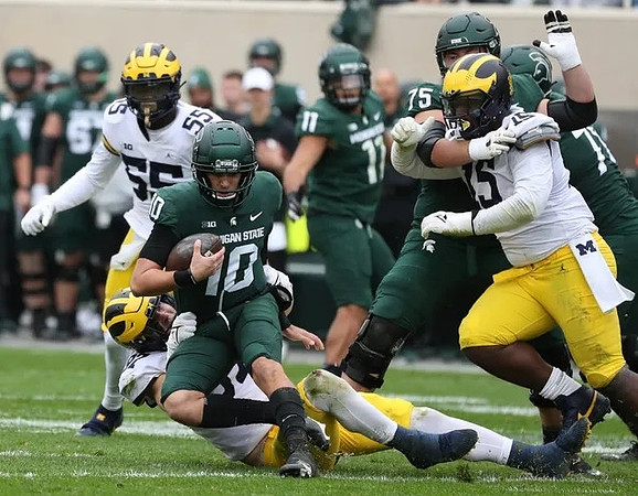 David Ojabo (55), Aidan Hutchinson (97), and Christopher Hinton (15)