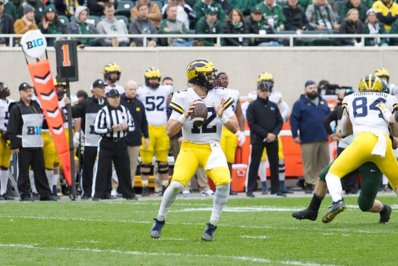 Cade McNamara (12) and Joel Honigford (84)