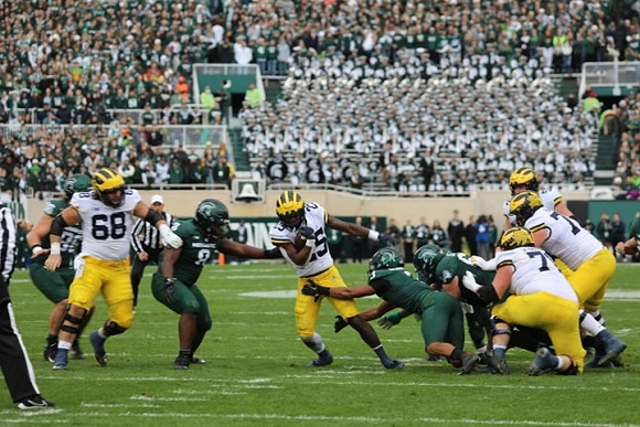 Andrew Vastardis (68) and Hassan Haskins (25)