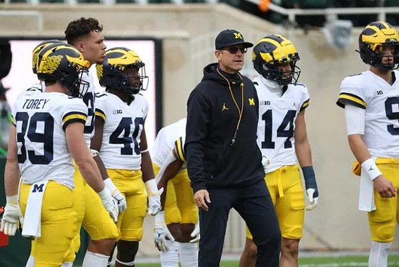 Jim Harbaugh and Michigan Team