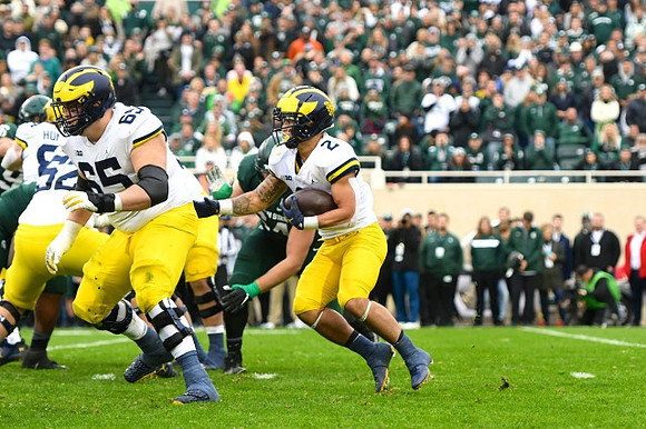 Joel Honigford (84), Karsen Barnhart (52), Zak Zinter (65), and Blake Corum (2)