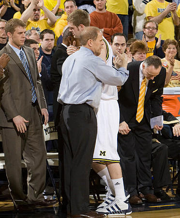 Zack Gibson (32) and John Beilein