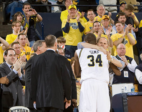 DeShawn Sims (34) and John Beilein