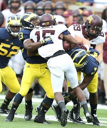 Royce Jenkins-Stone (52), Dennis Norfleet (23), and Delano Hill (44)