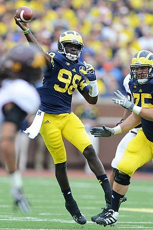 Devin Gardner (98) and Michael Schofield (75)