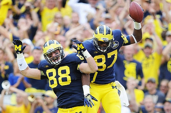 Jake Butt (88) and Devin Funchess (87)