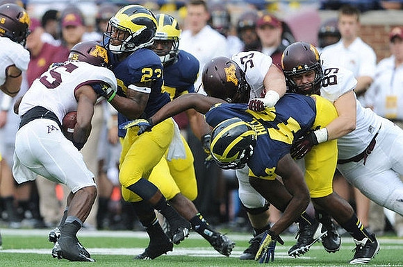 Dennis Norfleet (23) and Delano Hill (44)