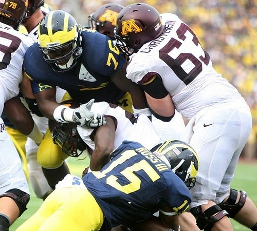 Quinton Washington (76) and James Ross (15)