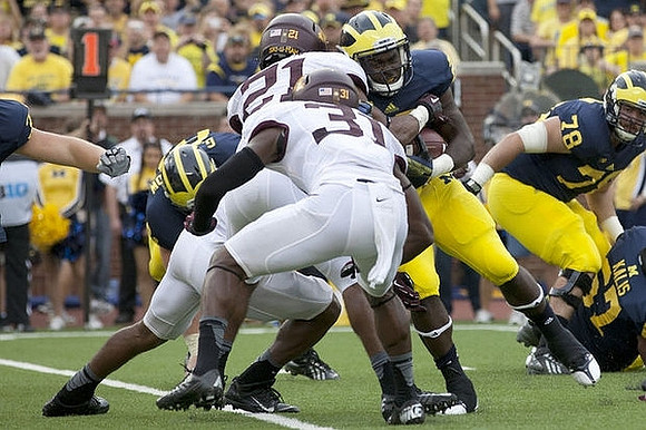 Graham Glasgow (61), Fitzgerald Toussaint (28), Erik Magnuson (78), and Kyle Kalis (67)