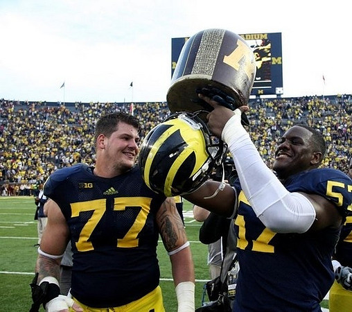 Taylor Lewan (77) and Frank Clark (57)