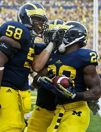 Chris Bryant (58) and Fitzgerald Toussaint (28)