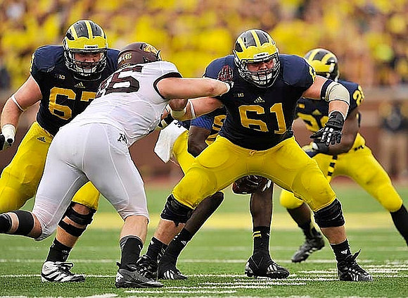 Kyle Kalis (67), Graham Glasgow (61), and Fitzgerald Toussaint (28)