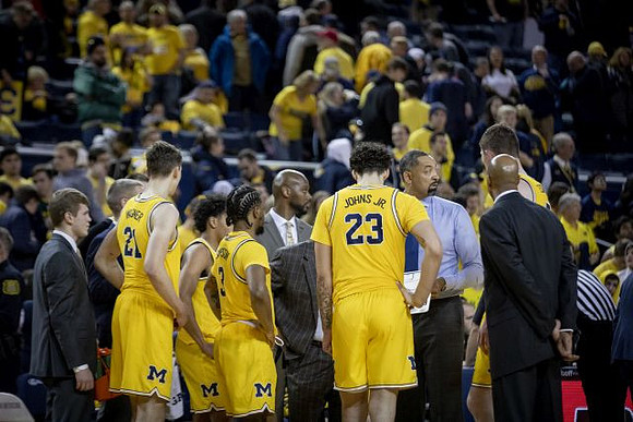 Juwan Howard and Michigan Team