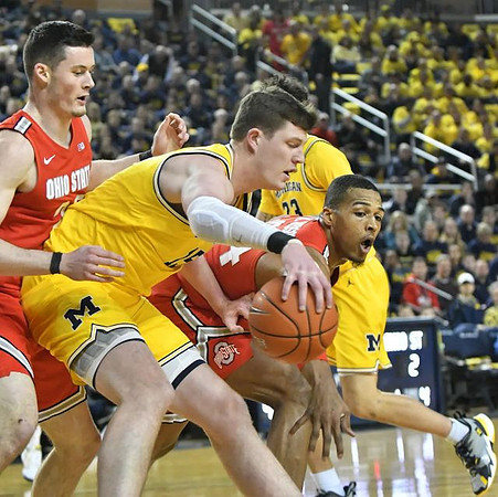 Jon Teske (15) and Brandon Johns Jr. (23)