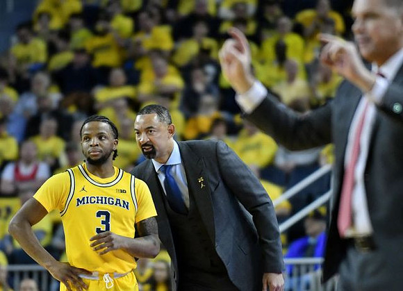 Isaiah Livers (2) and Juwan Howard