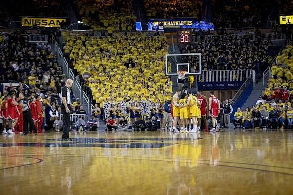 Jon Teske (15), Eli Brooks (55), and Brandon Johns Jr. (23)