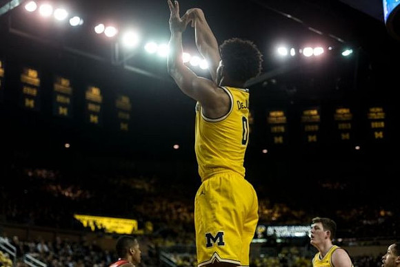 David DeJulius (0) and Jon Teske (15)