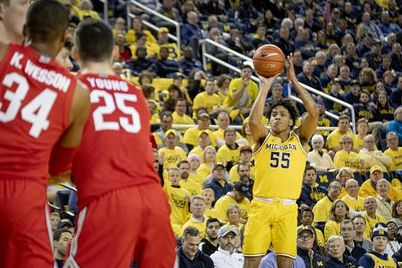 Eli Brooks (55) and Brandon Johns Jr. (23)