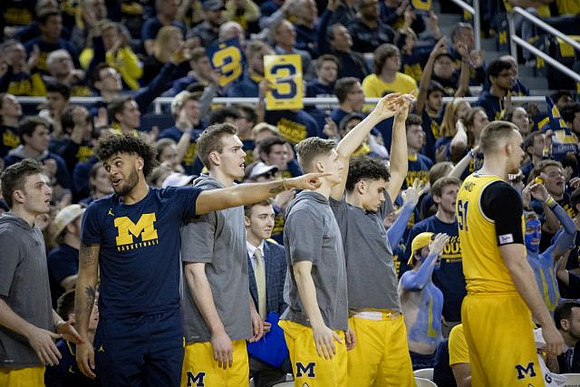 Luke Wilson (32), Isaiah Livers (2), Jaron Faulds (44), Cole Bajema (22), Adrien Nunez (5), and Austin Davis (51)