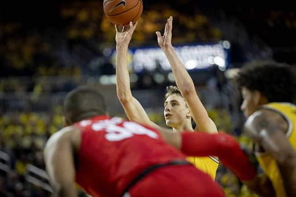 Franz Wagner (21) and Eli Brooks (55)
