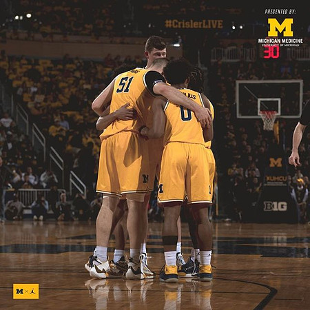 Austin Davis (51), Jon Teske (15), David DeJulius (0), and Zavier Simpson (3)