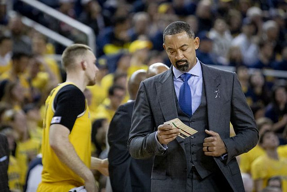 Juwan Howard and Austin Davis (51)