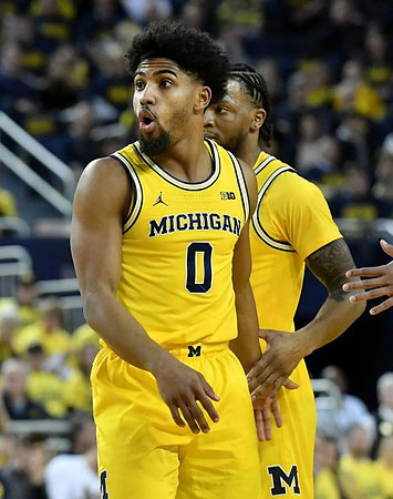 David DeJulius (0) and Zavier Simpson (3)