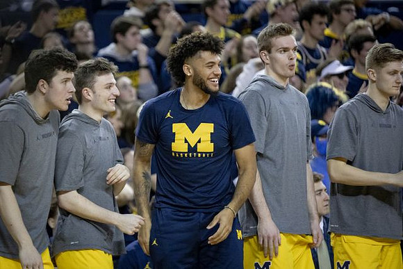 C.J. Baird (24), Luke Wilson (32), Isaiah Livers (2), Jaron Faulds (44), and Cole Bajema (22)