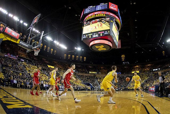 Jon Teske (15), Franz Wagner (21), and Brandon Johns Jr. (23)