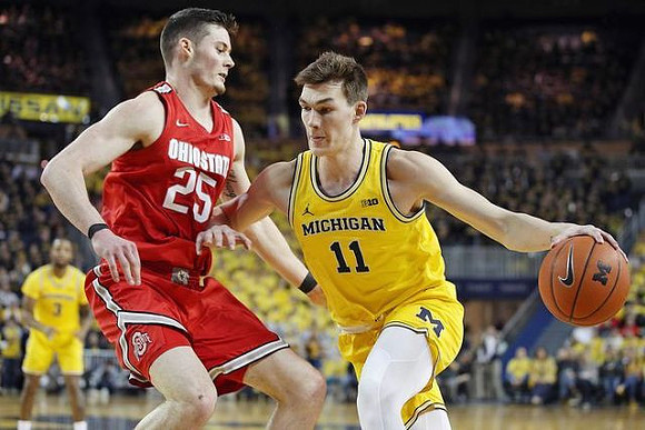Zavier Simpson (3) and Colin Castleton (11)
