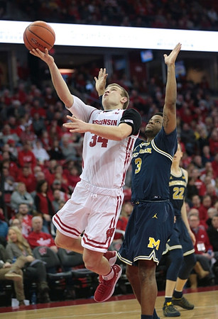 Zavier Simpson (3) and Duncan Robinson (22)
