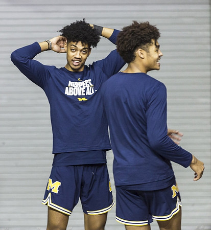 Ibi Watson (23) and Jordan Poole (2)