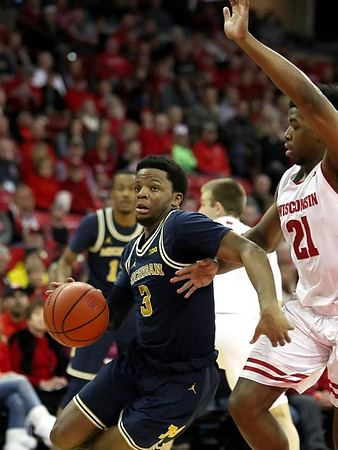 Zavier Simpson (3) and Muhammad-Ali Abdur-Rahkman (12)