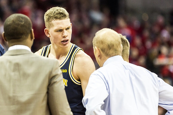 Moritz Wagner (13) and John Beilein
