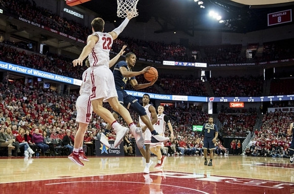 Muhammad-Ali Abdur-Rahkman (12) and Zavier Simpson (3)