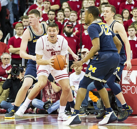Jon Teske (15), Muhammad-Ali Abdur-Rahkman (12), and Duncan Robinson (22)