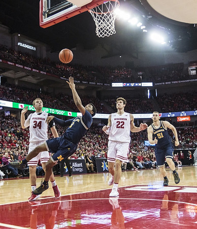 Zavier Simpson (3) and Austin Davis (51)