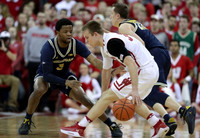 Zavier Simpson (3) and Duncan Robinson (22)