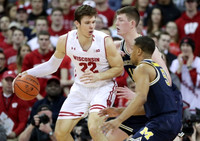 Jaaron Simmons (5) and Jon Teske (15)