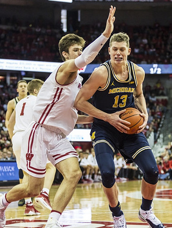 Moritz Wagner (13) and Duncan Robinson (22)