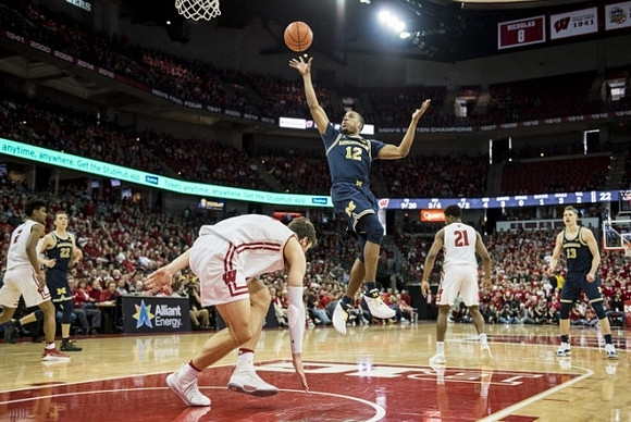 Muhammad-Ali Abdur-Rahkman (12), Duncan Robinson (22), and Moritz Wagner (13)