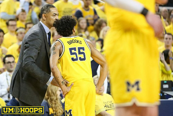 Juwan Howard and Eli Brooks (55)