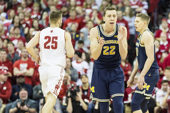 Duncan Robinson (22) and Moritz Wagner (13)