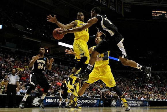 Glenn Robinson III (1) and Jordan Morgan (52)